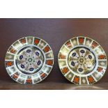 A pair of Royal Crown Derby 1128 Imari pattern dinner plates, one second