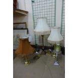 Four gilt metal table lamps and one other