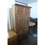 A George III pine housekeeper's cupboard, 188cms h, 99cms w, 33cms d