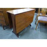 A G-Plan Fresco teak drop-leaf table