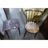A carved oak occasional table and a Victorian beech penny seat kitchen chair