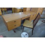 A G-Plan teak desk and chair