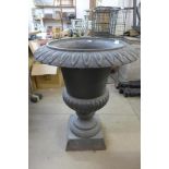 A Victorian cast iron campana garden urn