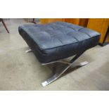 A Barcelona black leather and chrome stool