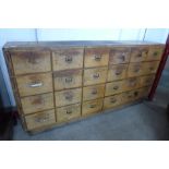 A part pine twenty-four drawer haberdashery cabinet