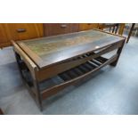 A teak and copper topped Egyptian Revival coffee table