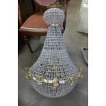 A French Empire style gilt metal and glass bag shaped chandelier