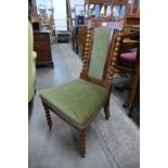 A Victorian walnut and fabric upholstered lady's chair