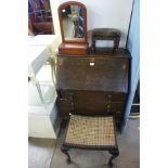 An oak bureau, a Victorian mahogany toilet mirror, Victorian mahogany stool and another stool