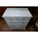 A small painted mahogany chest of drawers