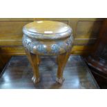A Chinese carved hardwood stool