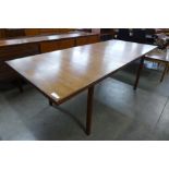 An Archie Shine teak extending dining table, designed by Robert Heritage