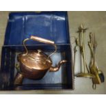 A large copper kettle, copper measure, wine funnel and a brass companion set in a tin trunk **PLEASE