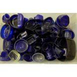 A box of blue glass liners etc.