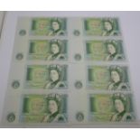 Seven uncirculated £1 notes, six in sequential order
