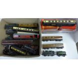 A collection of OO gauge model rail and four empty boxes