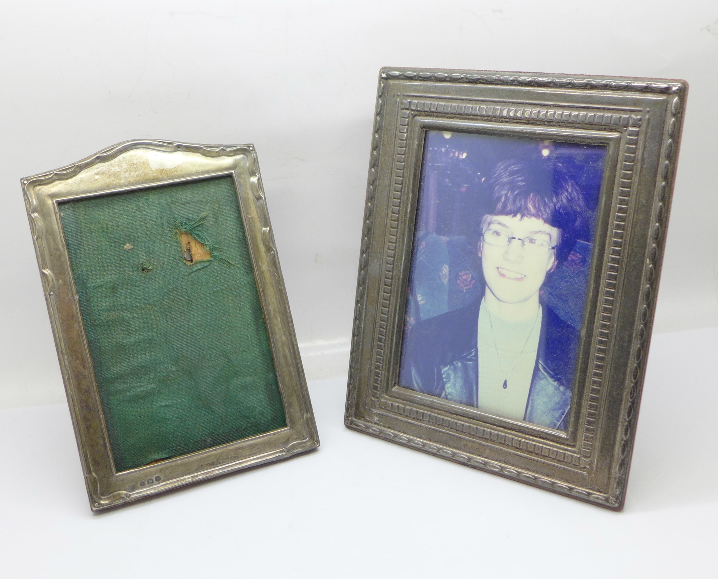 Two silver fronted photograph frames