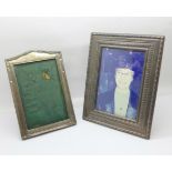 Two silver fronted photograph frames