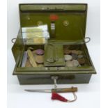 A tin of British coins including 50% silver, a brooch and two pen knives