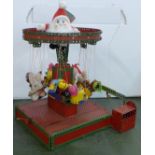 A Meccano carousel (hand operated), 42cm