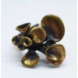 A brutalist design bronze ring