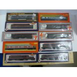 Ten items of OO gauge model railway, Bachmann x3, Lima x3 Hornby x3 and one Mainline, all boxed