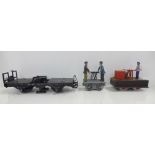 A LGB powered no.2001 handcart plus track cleaning wagon and a Bachmann hand cart
