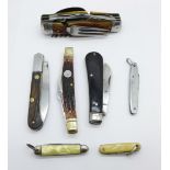 A collection of pocket knives including Rogers