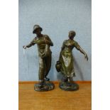 After Antoine Bofill, a pair of patinated spelter figures of two farm hands, girl a/f (arm repaired)