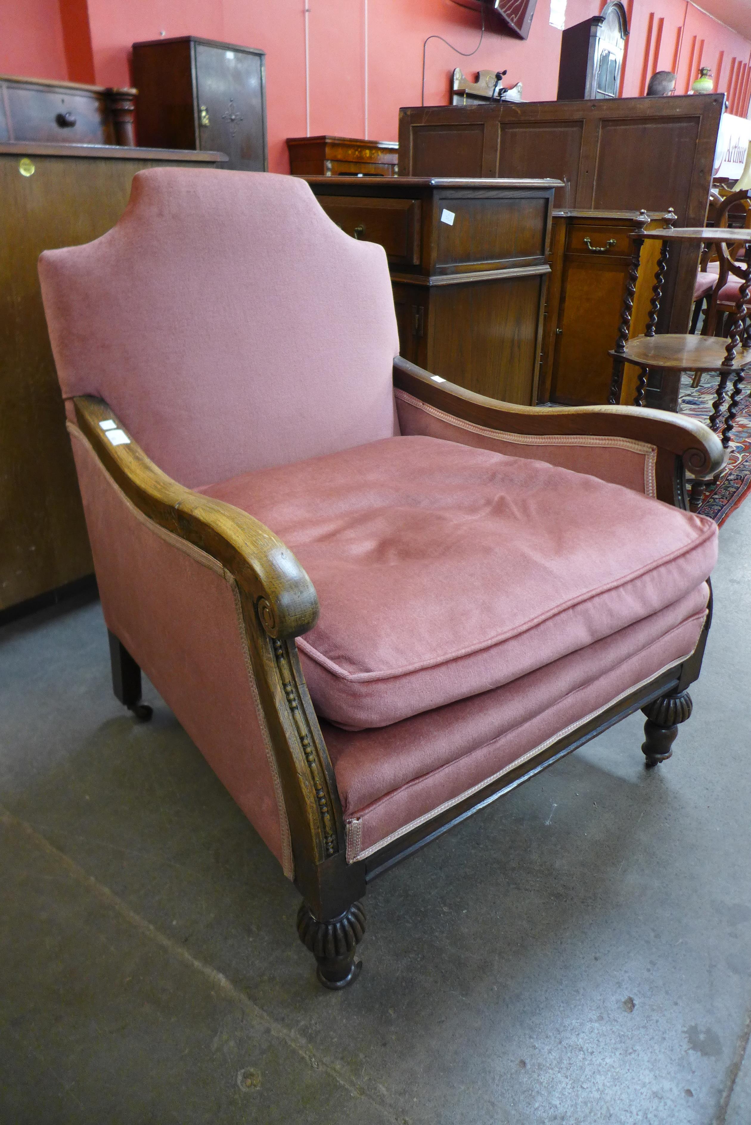 A George IV oak and fabric upholstered country house armchair