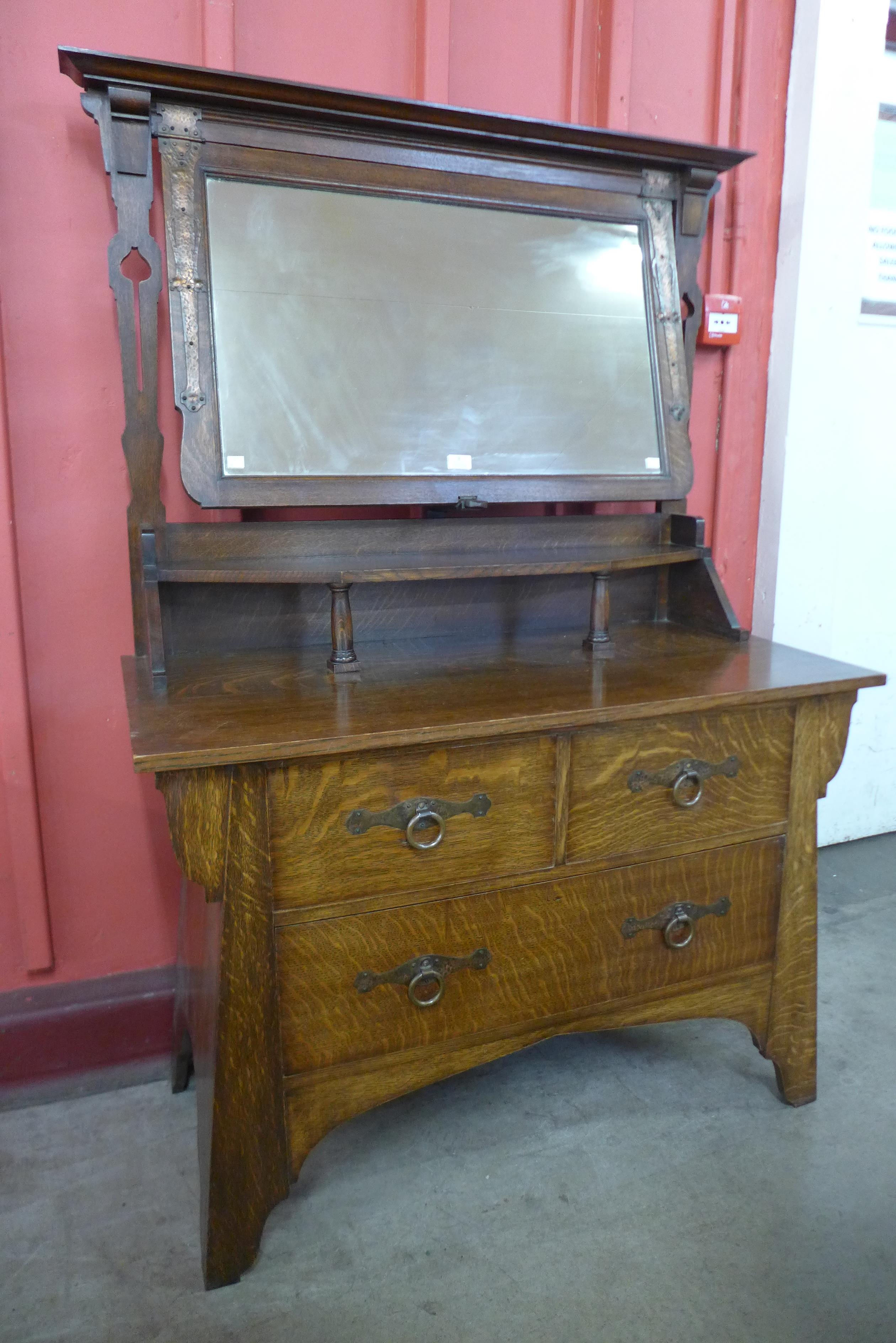 An Arts and Crafts oak and copper mounted dressing chest, manner of Liberty & Co. - Bild 2 aus 3