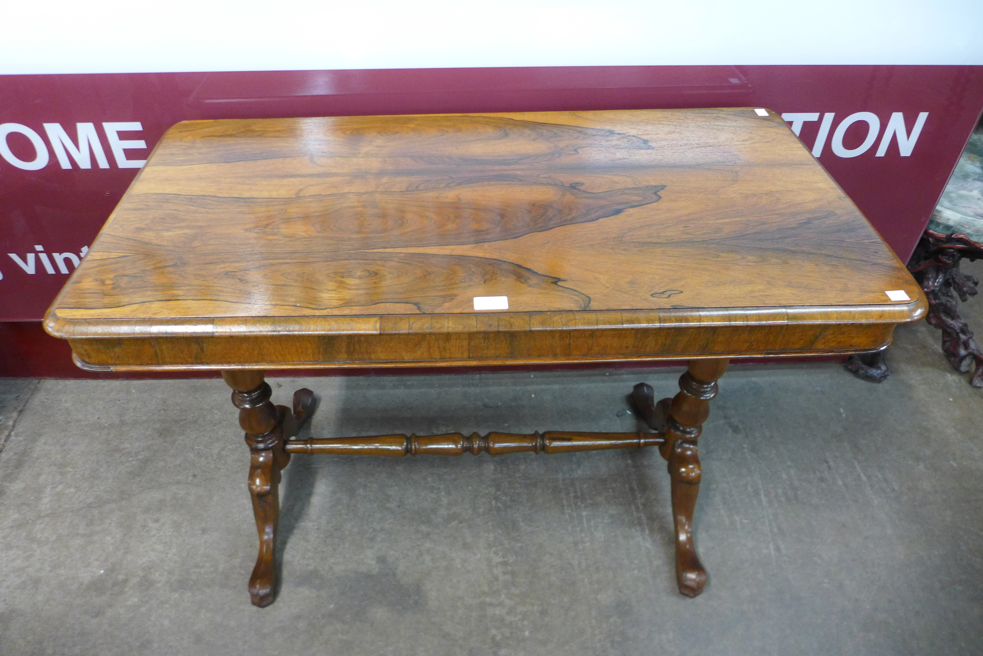 A Victorian rosewood stretcher table