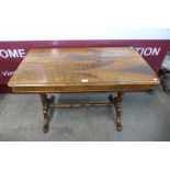 A Victorian rosewood stretcher table