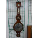 A George III mahogany banjo barometer