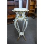 An Italian style cream and parcel gilt jardiniere stand