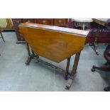 A Victorian walnut Sutherland table