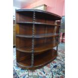 A Victorian mahogany demi lune barleytwist open bookcase