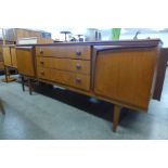 A teak concave sideboard