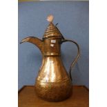 A large North African copper ewer