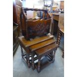 An oak nest of tables and a newspaper stand