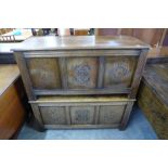 A pair of carved oak blanket boxes