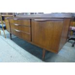 A Beautility teak bow front sideboard