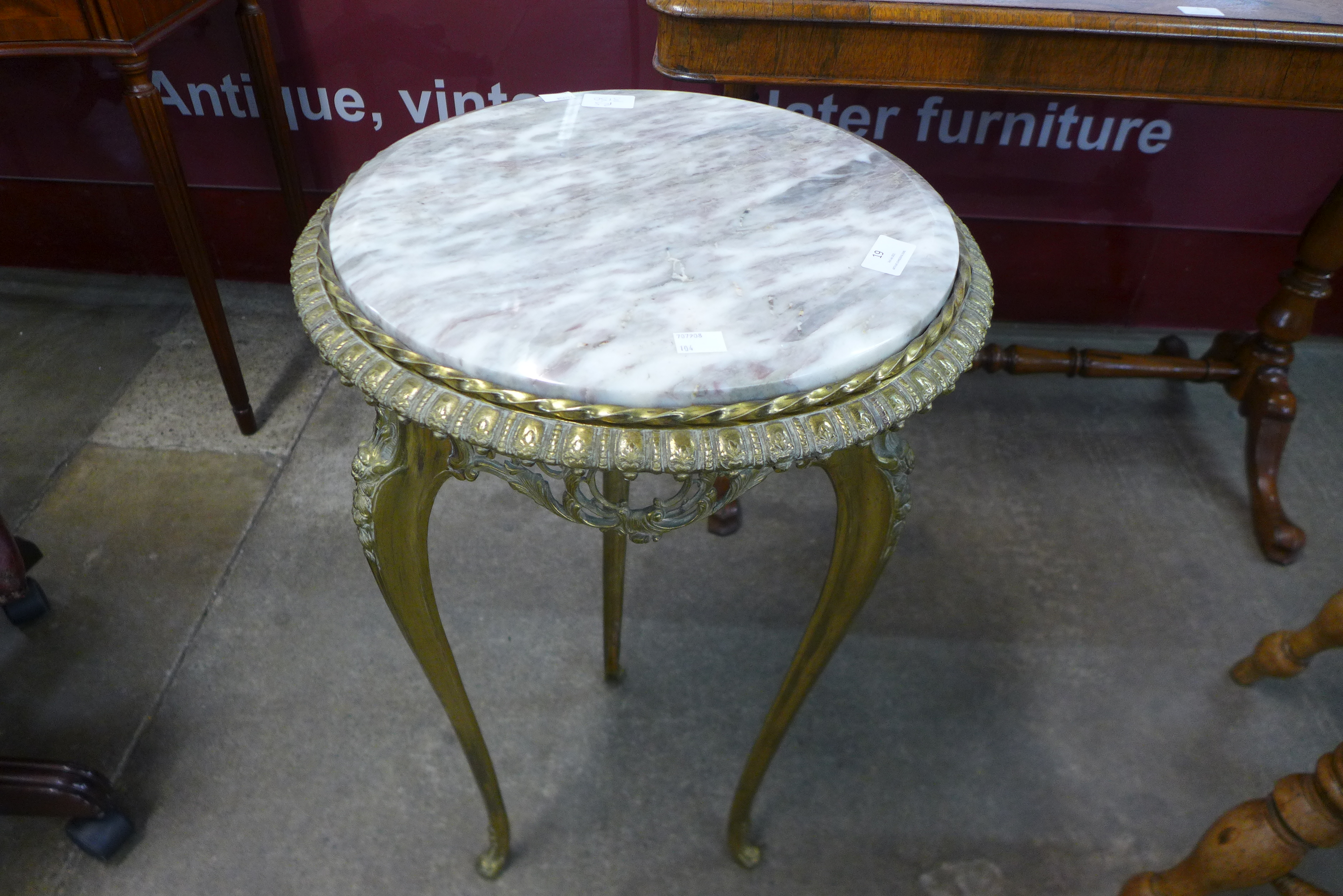 A French Louis XV style ormolu and marble topped circular jardiniere stand