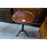 An inlaid mahogany tripod wine table