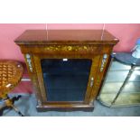 A Victorian style marquetry inlaid walnut and gilt metal mounted pier cabinet