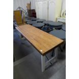 A painted pine trestle table