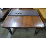 A Victorian mahogany extending dining table