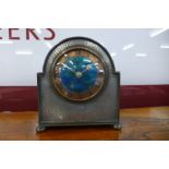 A Liberty & Co. Arts and Crafts Tudric Pewter mantel timepiece, with turquoise enamelled dial, the