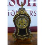 A 19th Century French Boulle style mantel timepiece, stamped Marti & Cie. (lacking pendulum)