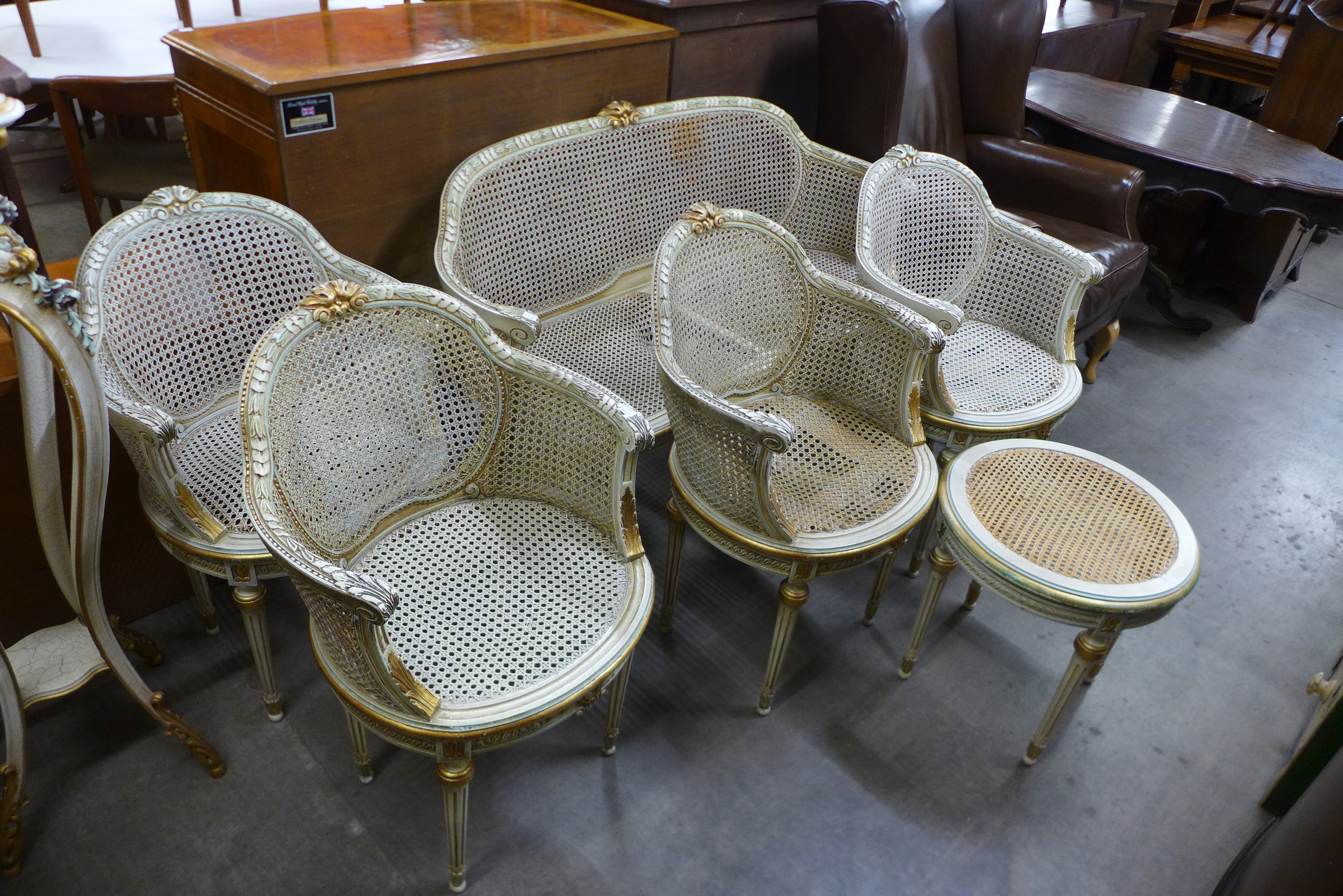 A French style cream and parcel gilt six piece salon suite